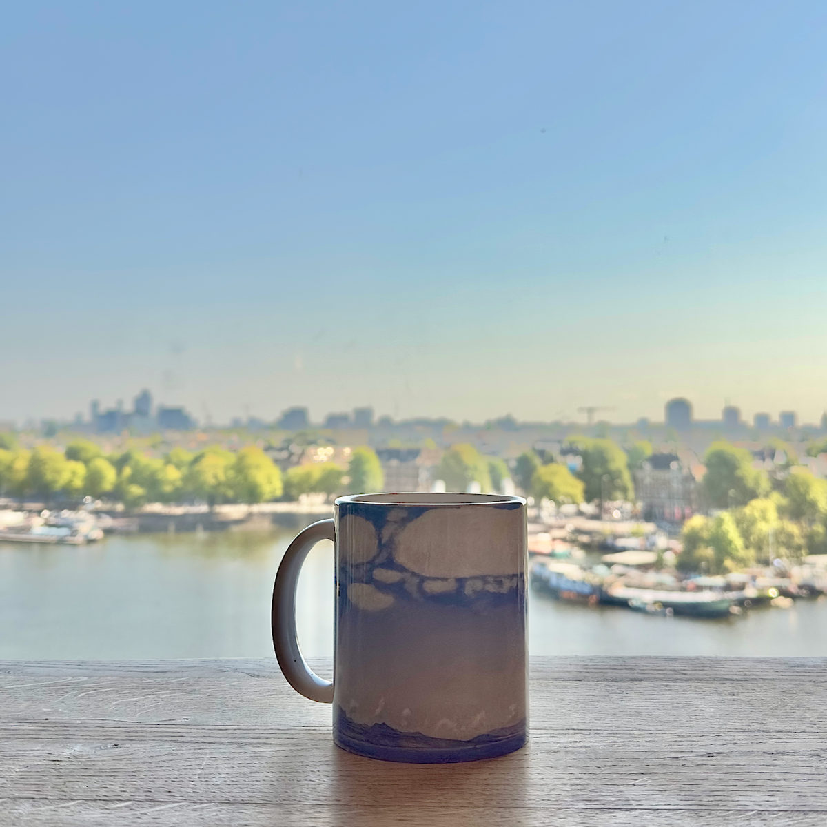 Ferdinand Hodler ceramic mug filled with coffee, featuring “Lake Geneva Seen from Chexbres” artwork, museum-quality gift for art lovers